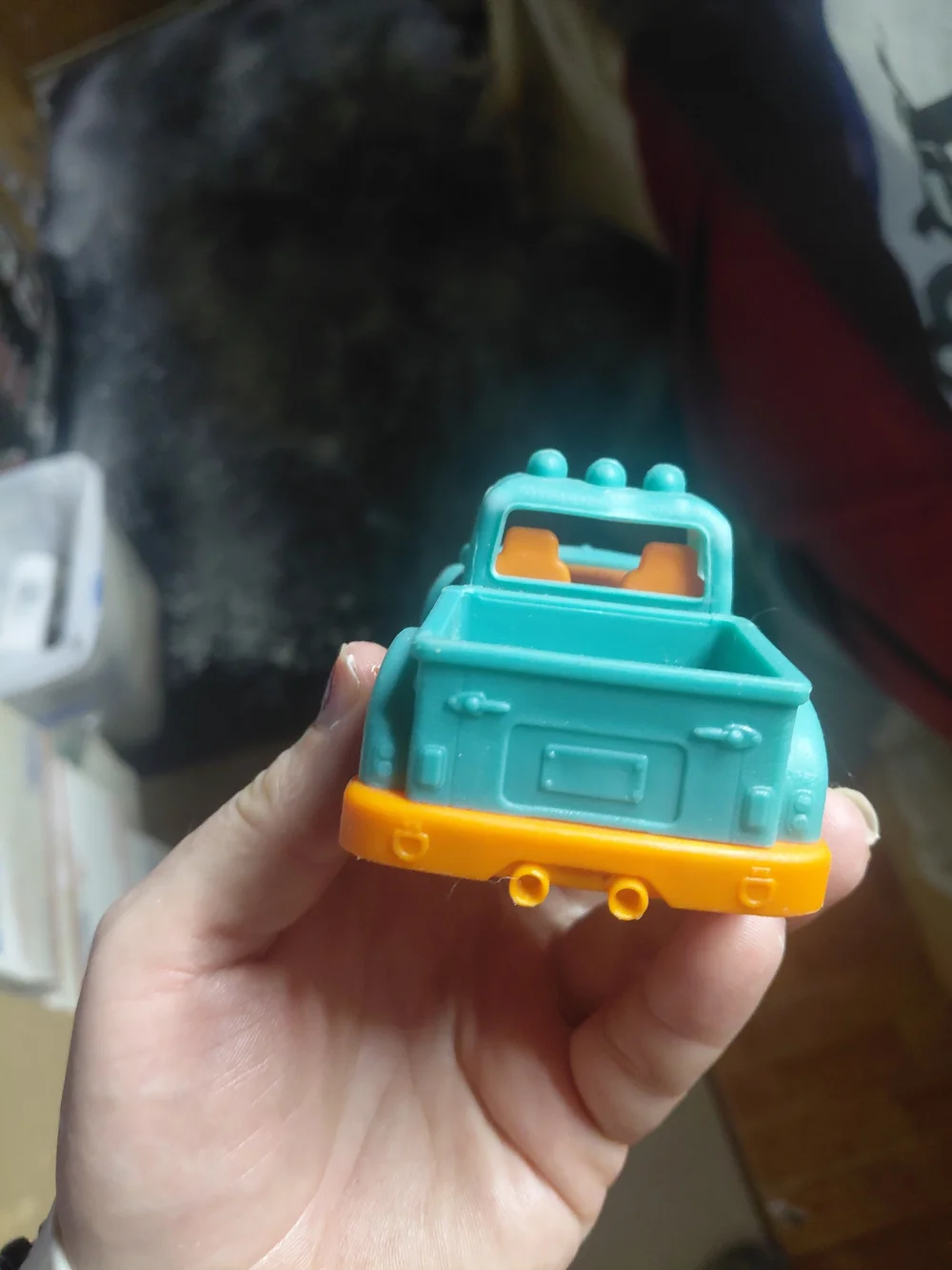 toy is a pickup truck from the B. toys Happy Cruisers collection